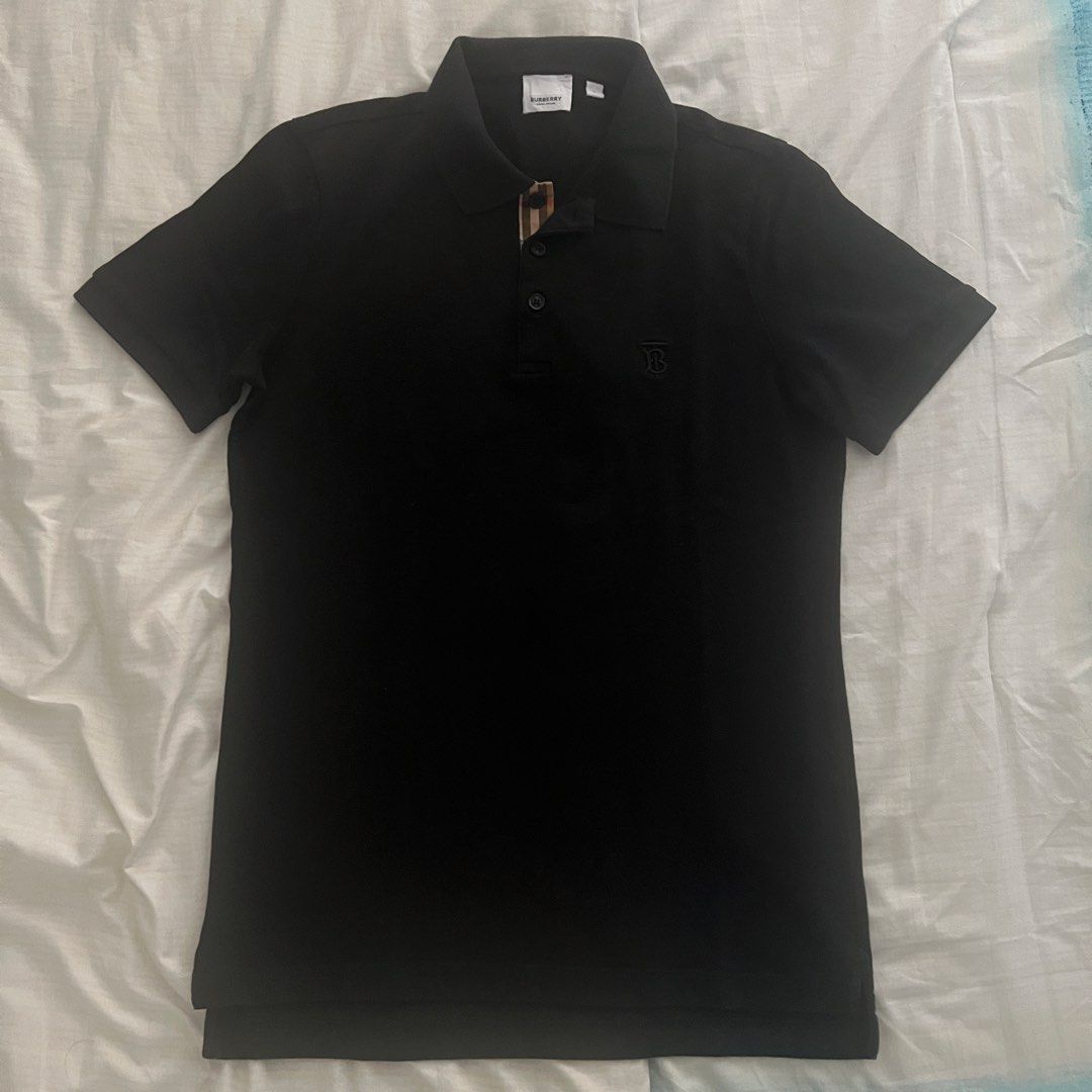 Burberry Black Polo Shirt with TB Monogram (Category: Tshirts & Polo Shirts ) located in Marikina City. Submitted by jamesdg (Listing ID 1448898528, Image 1). Description: Burberry Polo Shirt Size M No issues Color rate: 10/10 Dimension: 19.5x27-28 Guaranteed Original/Legit/Authentic.