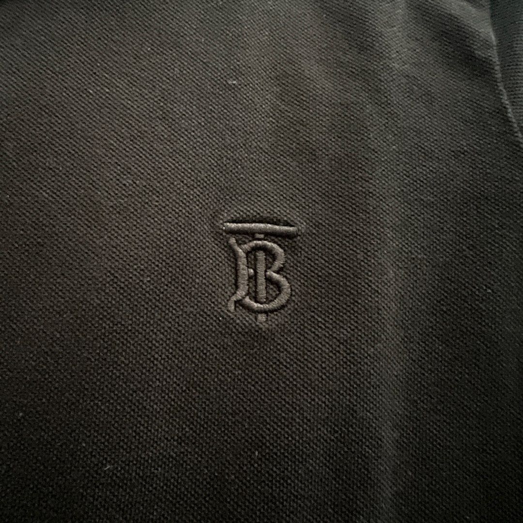 Burberry Black Polo Shirt with TB Monogram (Category: Tshirts & Polo Shirts ) located in Marikina City. Submitted by jamesdg (Listing ID 1448898528, Image 3). Description: Burberry Polo Shirt Size M No issues Color rate: 10/10 Dimension: 19.5x27-28 Guaranteed Original/Legit/Authentic.