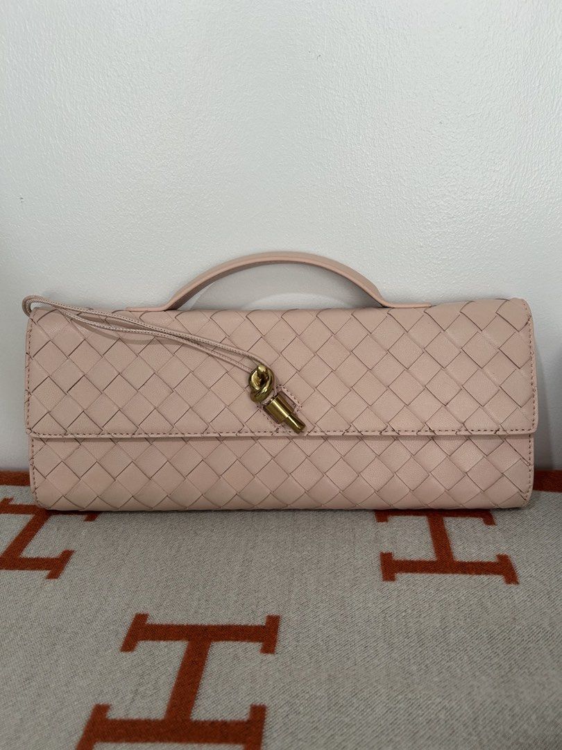 BV Andiamo Clutch (Category: Luxury Bags & Wallets) located in Manila. Submitted by rl_lux (Listing ID 1448920671, Image 1). Description: Bottega Veneta Andiamo Clutch - Nude/Flesh Pink color With Dustbag only.