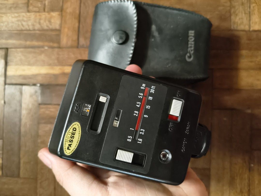 Canon Speedlite 188A External Flash with Case (Category: Flashes) located in Quezon City. Submitted by giveitalife (Listing ID 1448972994, Image 2). Description: - Vintage Canon Speedlite 188A external flash - Perfect for film photography enthusiasts - Manual flash with adjustable ASA and aperture settings - Includes original Canon leather case - Tested and confirmed working stored only, slightly used.