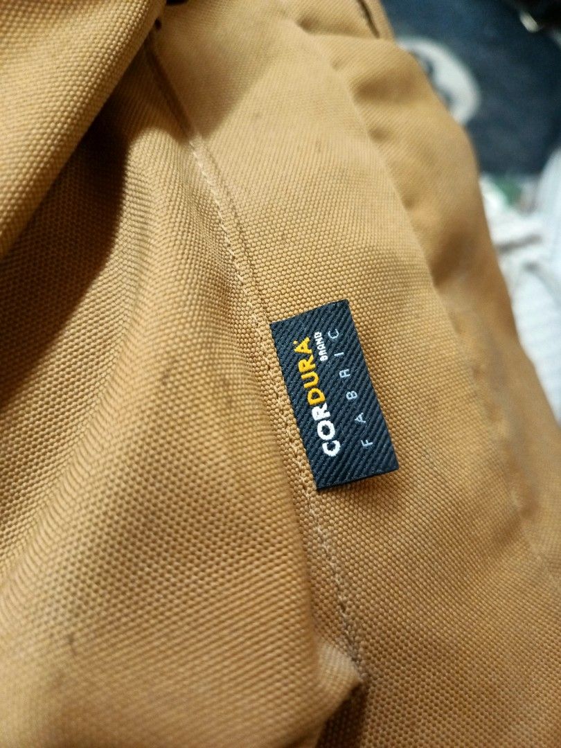 Carhartt Backpack Brown Cordura Fabric (Category: Backpacks) located in Legazpi City. Submitted by pickthatth34541 (Listing ID 1449033377, Image 3). Description: - Durable brown Carhartt backpack - Made with tough Cordura fabric - Main compartment with internal zippered pocket - Padded back and straps for maximum comfort - Ample space for all your essentials - Ideal for everyday use and travel.