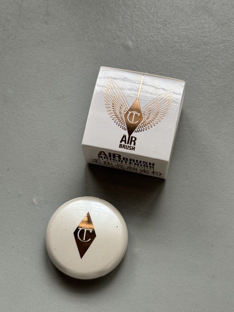 Charlotte Tilbury Brightening Powder MINI SIZE (Category: Makeup) located in Quezon City. Submitted by auntie.cart (Listing ID 1448965671, Image 2). Description: - Authentic - Bought from authentic make up supplier - Still with box - Used twice - Rfs: not hiyang for me - Will surely sanitize before shipping out.