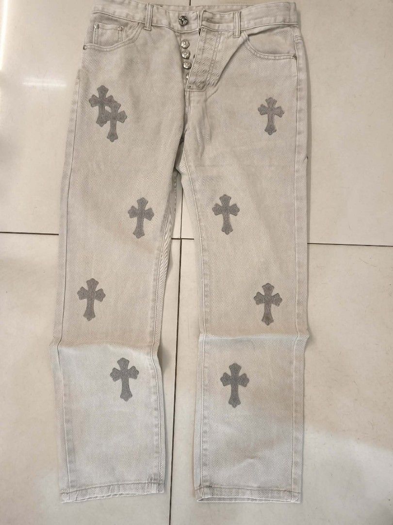 Chrome Hearts x Levi's 501 Jeans (Category: Jeans) located in Manila. Submitted by matthewlla74087 (Listing ID 1448983904, Image 1). Description: 32x40 - Classic Levi's 501 fit - Light wash denim - Unique cross embellishments throughout - Button fly closure - Iconic red tab and orange leather patch - Perfect statement piece for your wardrobe.