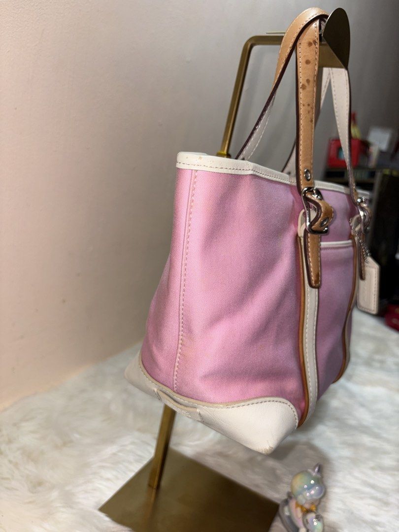 Coach Pink Mini Market Tote (Category: Luxury Bags & Wallets) located in Angeles City. Submitted by azter.archive (Listing ID 1449087210, Image 2). Description: RUSH SALE!!! Canvas needs cleaning, water damage on leather strap. No rubs and cracks. Open for Layaway: 30% DP (non refundable) 30 days to pay 💕 Visit my IG page for more details 🌸 -azter.archive.