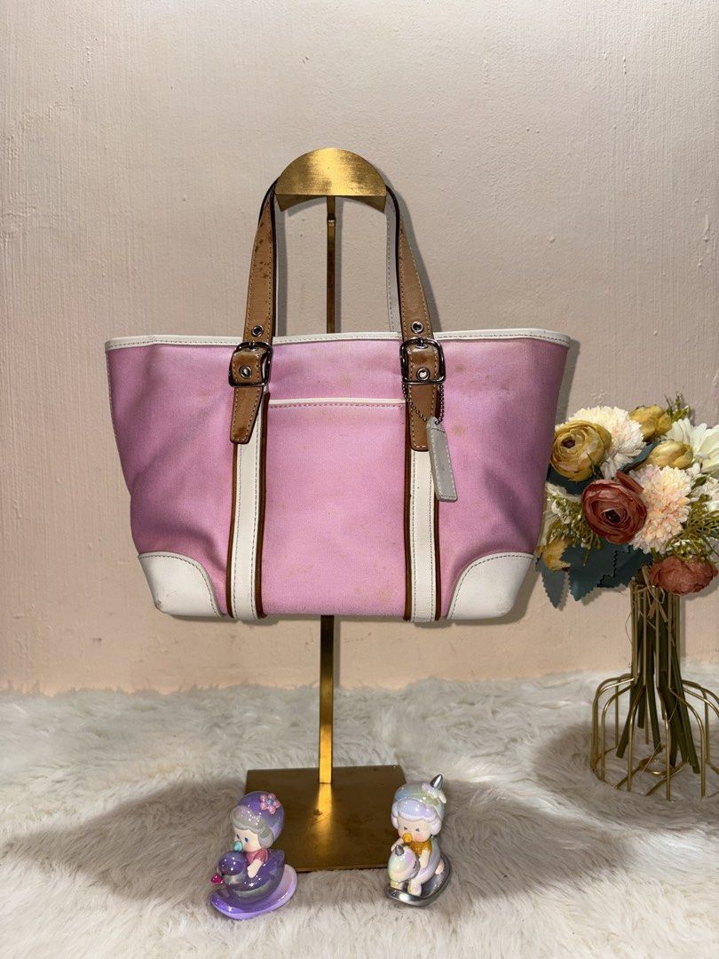 Coach Pink Mini Market Tote (Category: Luxury Bags & Wallets) located in Angeles City. Submitted by azter.archive (Listing ID 1449087210, Image 1). Description: RUSH SALE!!! Canvas needs cleaning, water damage on leather strap. No rubs and cracks. Open for Layaway: 30% DP (non refundable) 30 days to pay 💕 Visit my IG page for more details 🌸 -azter.archive.