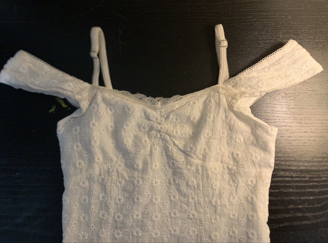 Coquette White Offshoulder Dress (Category: Dresses) located in Cavite. Submitted by issaeurrr (Listing ID 1449090024, Image 2). Description: -embroidered cotton -satin inner -ruffled bottoms -functional side zipper -very pretty in person.