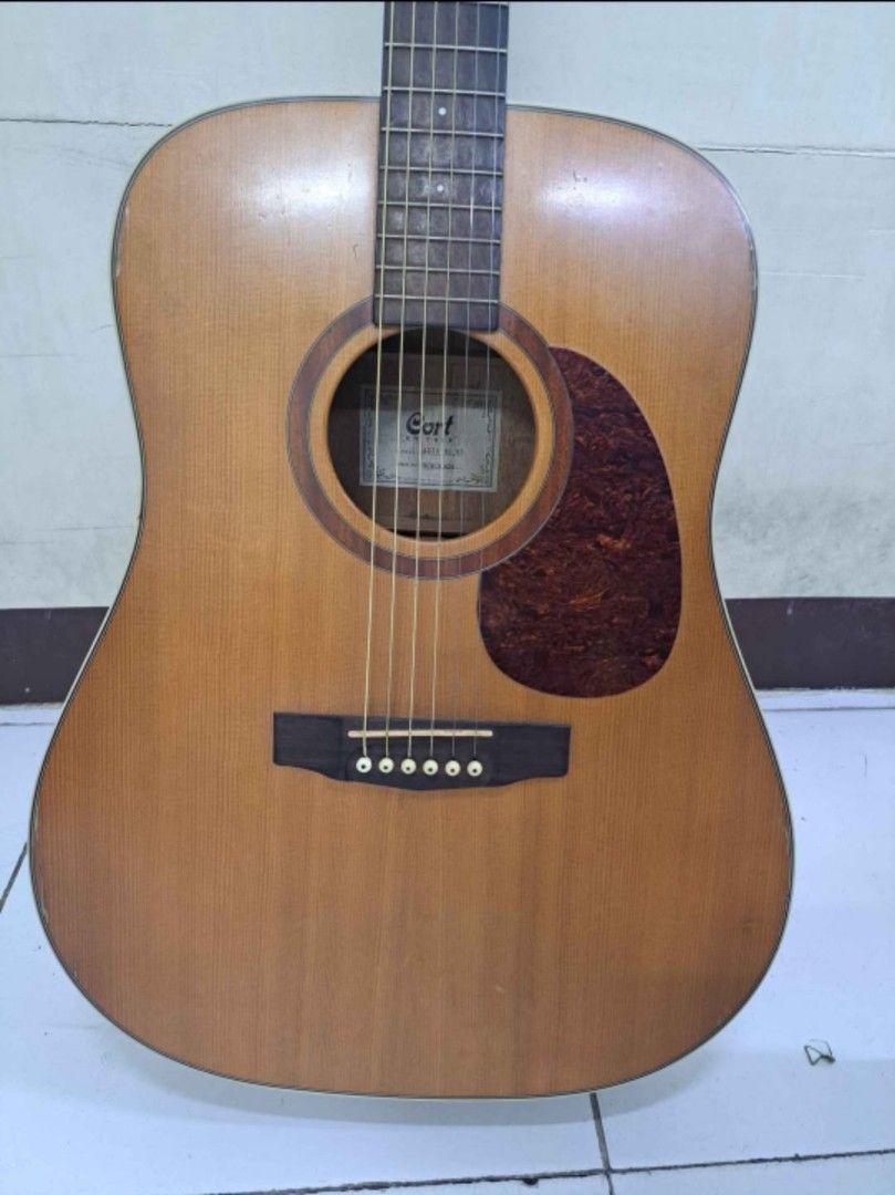 CORT EARTH E100NS (Category: Musical Instruments) located in Manila. Submitted by aruduo-in (Listing ID 1448943656, Image 2). Description: (SWAP SA EG) OR FORSALE PAMIGAY PRICE 8K NALANG (17K ORIG PRICE) CORT E100NS Top: Solid Sitka Spruce Back & Sides: Mahogany Fingerboard Material: Ovangkol Nut & Saddle Material: Genuine Bone SOLID SPRUCE TOP WITH PADDED BAG WITHIN METRO MANILA LOC.