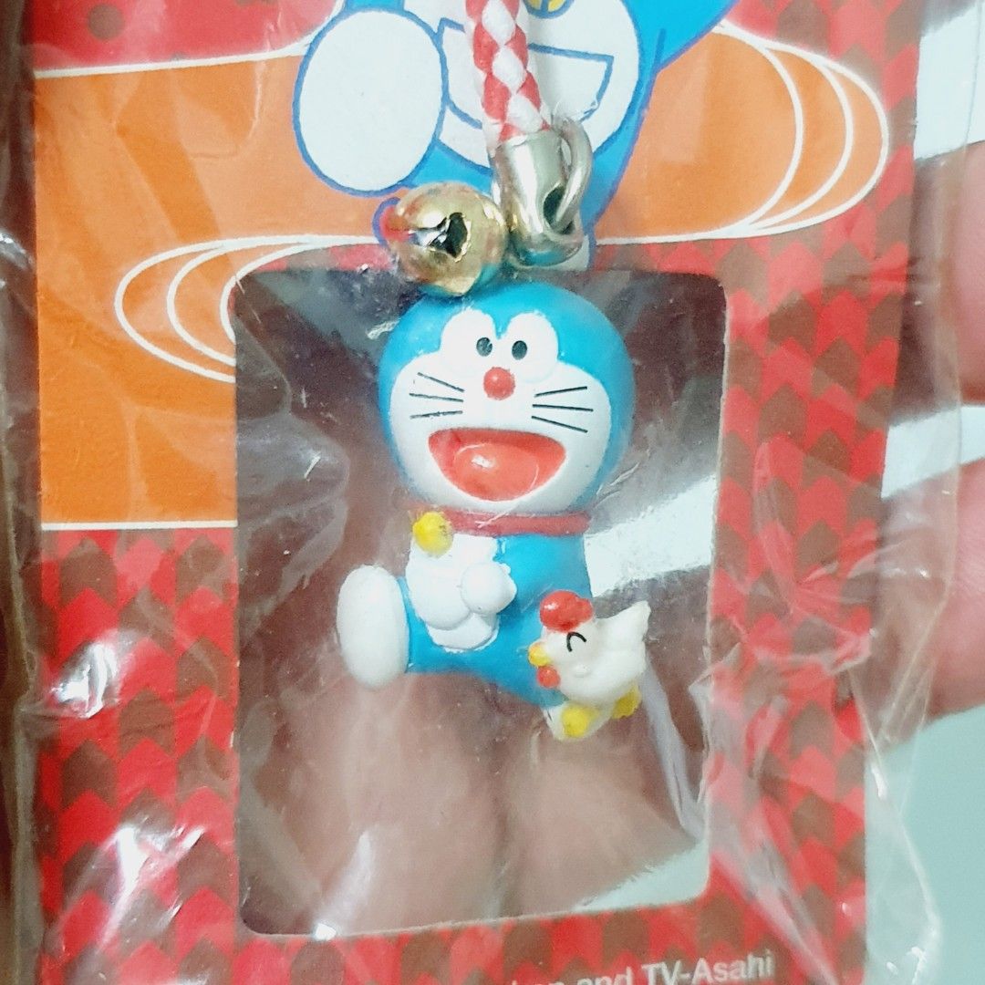 Doraemon Mascot Keychain Charm (Category: Character Goods) located in Taytay. Submitted by kyo.mono (Listing ID 1449060806, Image 2). Description: 💟Follow us on IG: kyo.mono for faster replies TikTok: kyo.mono_ for videos and review Brand new and sealed Auth from Japan Actual photo posted.