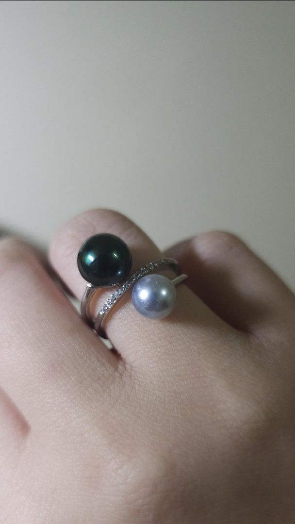 Double South Sea Pearl with certificate (Category: Rings) located in Batangas. Submitted by finestonesandfindsph (Listing ID 1449079909, Image 1). Description: - Unique crossover ring design - Features two pearls: one dark grey, one light grey - Accented with small stones along the band micron settings -with certificate - Adds a touch of sparkle to any outfit - Ideal for gifting or personal indulgence.
