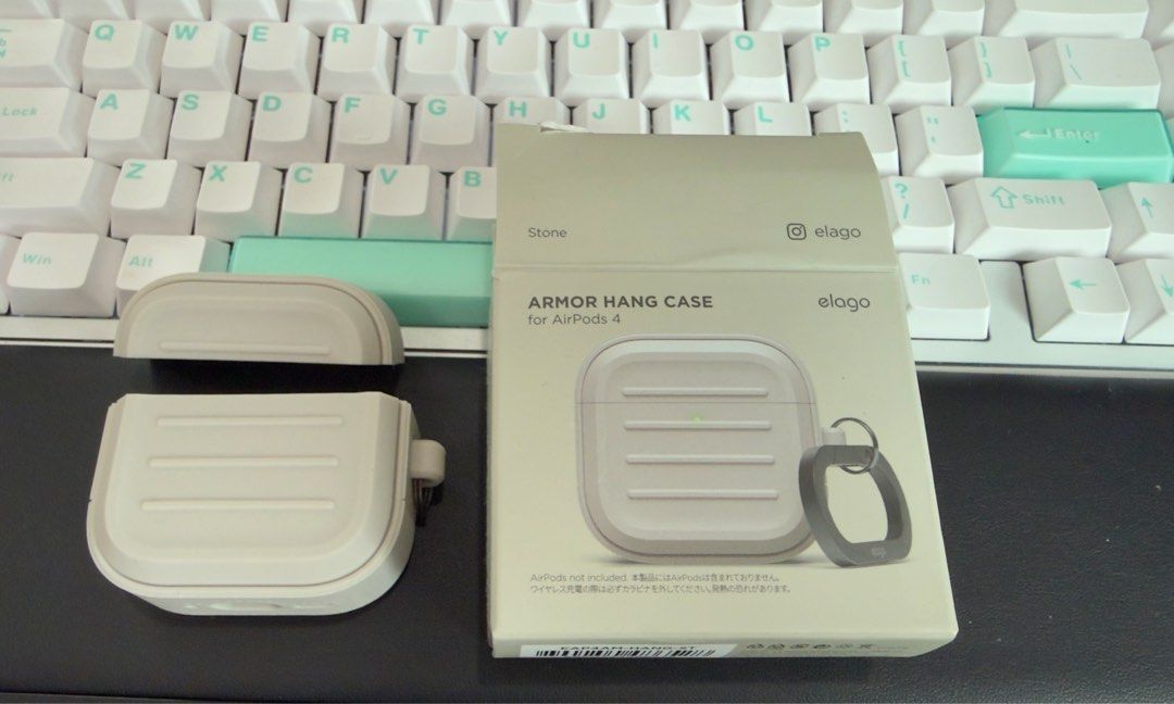 Elago Armor Hang Case for *AirPods 4* (Stone) (Category: Cases & Sleeves) located in Paranaque City. Submitted by wheisenbergw (Listing ID 1448955939, Image 1). Description: - Elago Armor Hang Case for AirPods 4 - Color: Stone - Provides durable protection for your AirPods Pro - Includes carabiner for easy attachment and portability - Selling because I checkout the wrong one for my airpods pro.