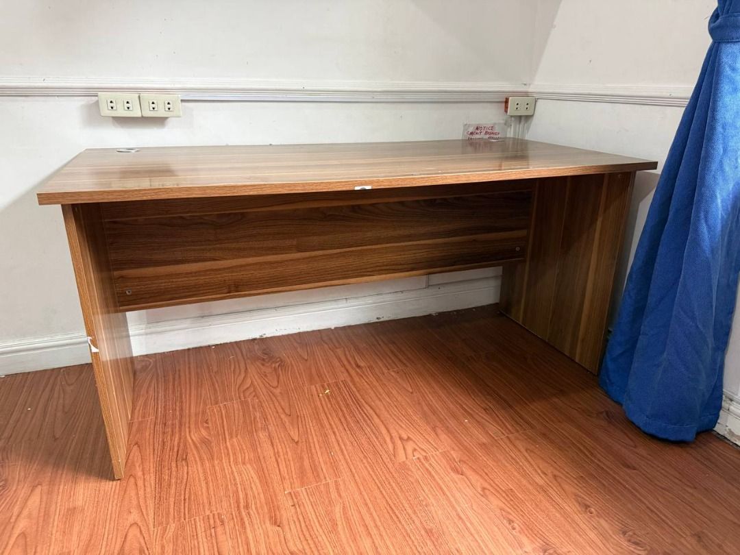 Executive Office Desk | Large Wooden Computer Table with Cable Grommets (Category: Tables & Sets) located in Pasig City. Submitted by rctaneo24 (Listing ID 1449031063, Image 3). Description: Upgrade your home office or workspace with this sturdy executive office desk featuring a modern wood finish. Spacious tabletop provides plenty of room for a laptop, monitor, keyboard, and office essentials. Includes 2 built-in cable management grommets for a 
