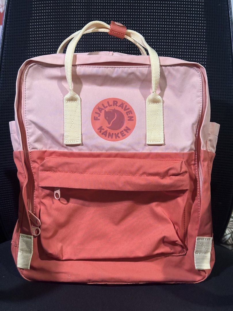 Fjallraven Kanken Mini - Pink & Coral (Category: Backpacks) located in Tarlac. Submitted by _dam3 (Listing ID 1448906973, Image 1). Description: authentic Fjallraven Kanken Backpack two-tone color: light pink (top) & coral (bottom) side pockets & front zip pocket in pristine condition ✨ includes seat-pad with laptop compartment 15" free shipping door to door via jnt .
