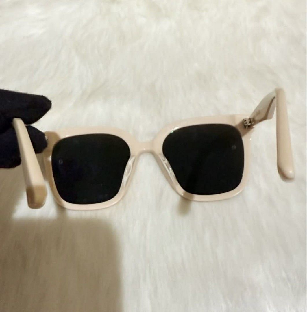 Gentle Monster Sunglasses with Case (Category: Sunglasses & Eyewear) located in Caloocan City. Submitted by mommyella22 (Listing ID 1446480605, Image 3). Description: - Brand: Gentle Monster - Frame Color: Cream - Lens Color: Black - Includes: Original white case - Perfect for: Sunny days.