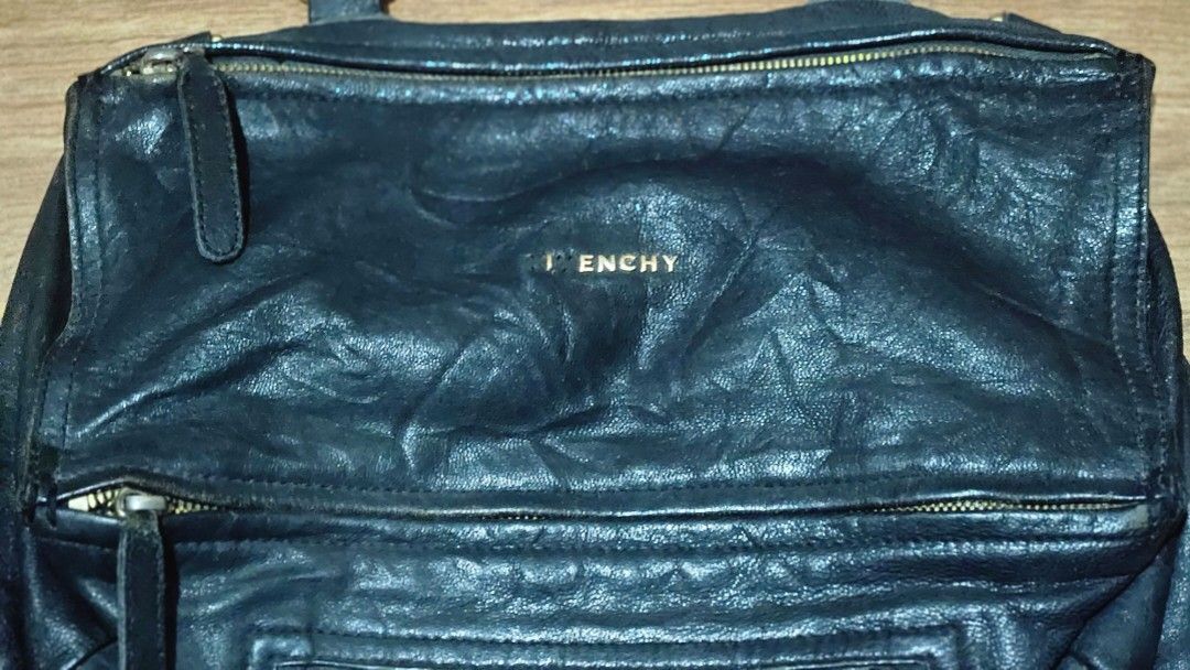 Givenchy bag (Category: Luxury Bags & Wallets) located in Balanga. Submitted by momstyle.ph (Listing ID 1449007555, Image 2). Description: Givenchy Pandora bag missing letter G & V missing sling strap Made in Italy Sale price ❤️.