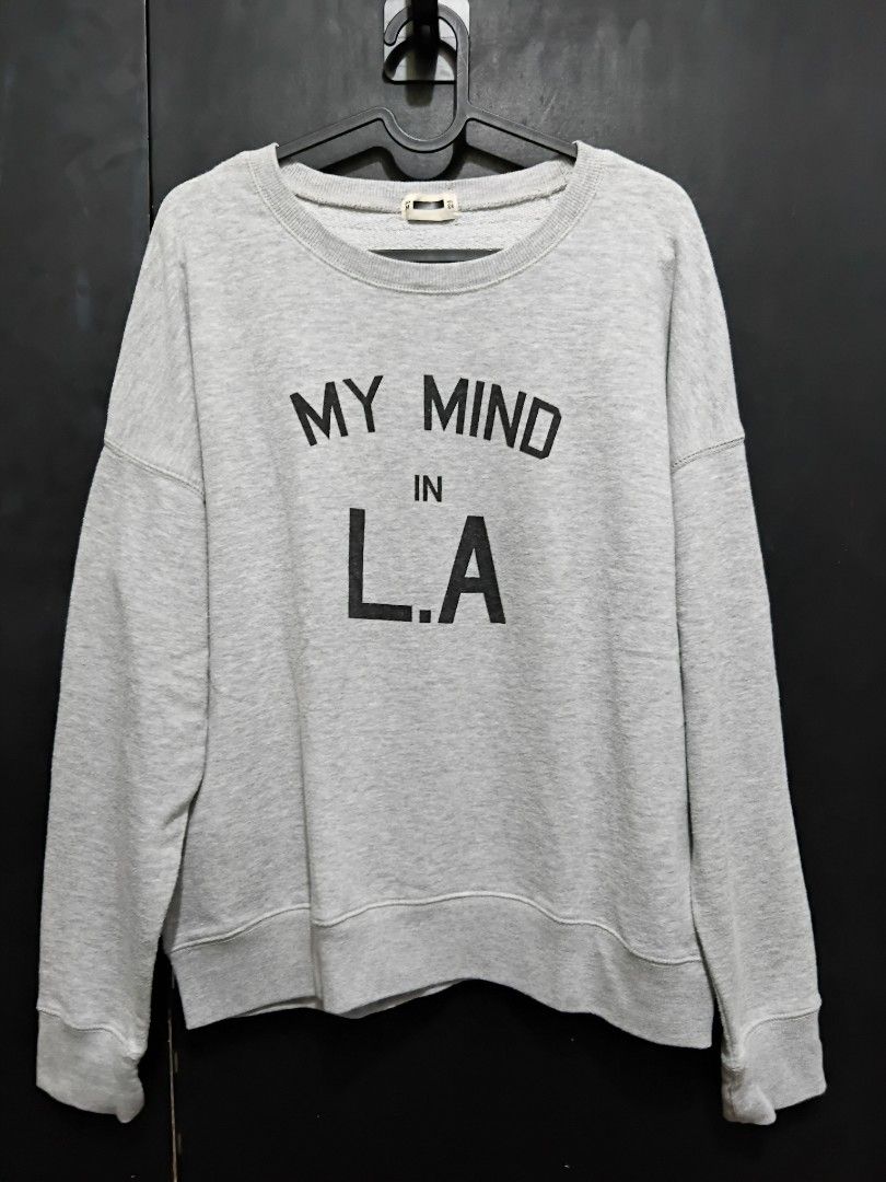 Grey "My Mind in LA" Sweatshirt (Category: Coats, Jackets and Outerwear) located in Manila. Submitted by ramcyanthony (Listing ID 1449050305, Image 1). Description: - Grey sweatshirt with 'My Mind in LA' graphic print - bust 23in length 24in - Crew neck, long sleeves - Comfortable and casual - Size M - Great for everyday wear.
