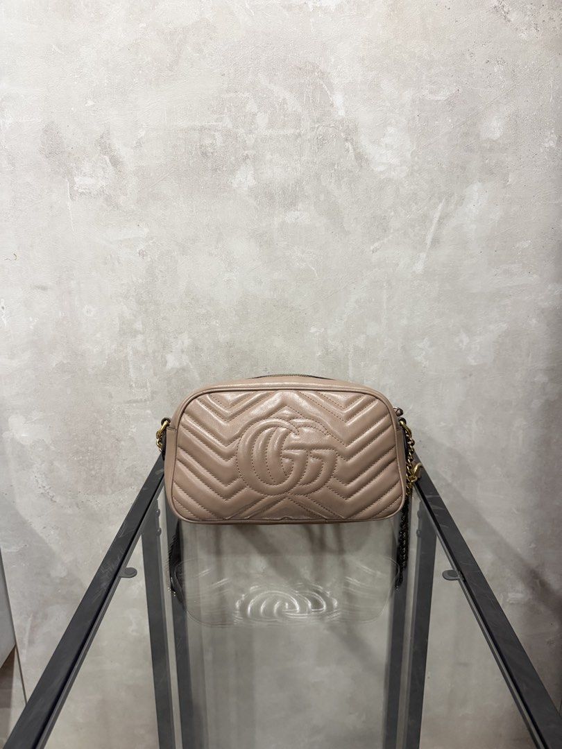 Gucci Camera Bag (Category: Bags & Wallets) located in Singapore. Submitted by earlcollection.co (Listing ID 1448969801, Image 2). Description: Gucci Marmont Bag Price: $620sgd Condition: B Colour: Beige Inclusive of: Bag only Measurements: W23 H13cm 💯Authenticity Guaranteed 🇸🇬Singapore Registered Company 🚚Free Same Day Delivery on all purchases 💵Sell Consign or Buy 📱Available on Carousell,Instagram ✈️International Shipping Available.