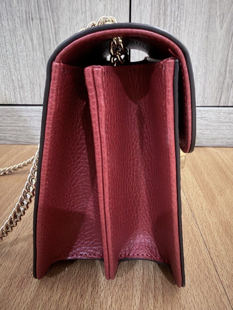 Gucci Interlocking Dollar in Red (Category: Luxury Bags & Wallets) located in Manila. Submitted by vra.luxe (Listing ID 1449021904, Image 3). Description: - Gucci Interlocking Dollar in Red Grained Calfskin Leather - Gold chain strap - Iconic GG logo hardware - Multiple interior compartments - Versatile for day or night use - A timeless classic.