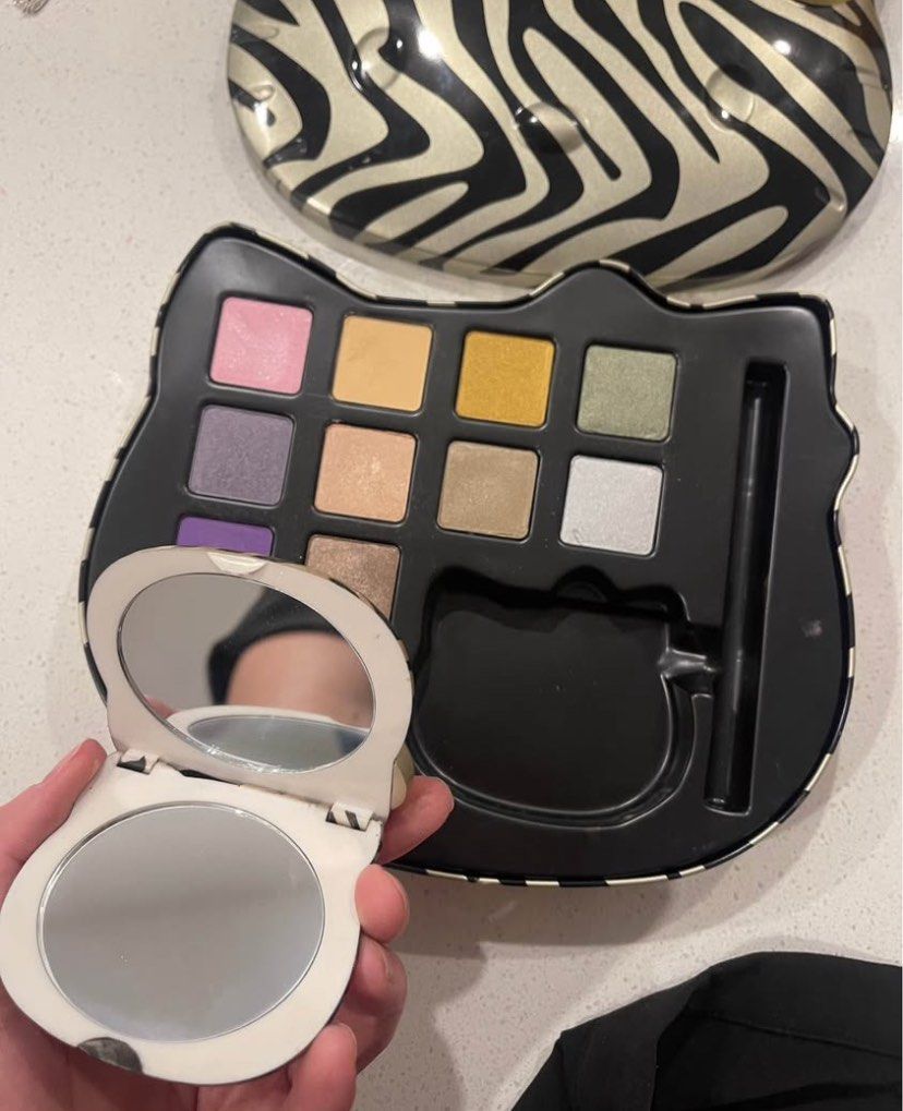 Hello Kitty Wild Thing Makeup Palette and Mirron (Category: Makeup) located in Quezon City. Submitted by cheerupbby (Listing ID 1449095804, Image 2). Description: Stored properly and kept well. Will ship when I get back home to the Philippines in October/November 2026. I will only bring what is SOLD. Half payment accepted with no cancellation. All makeup is crossposted on marketplace 🇨🇦 and nowhere else. 📍 QC Can ship thru lalamove or j&t.