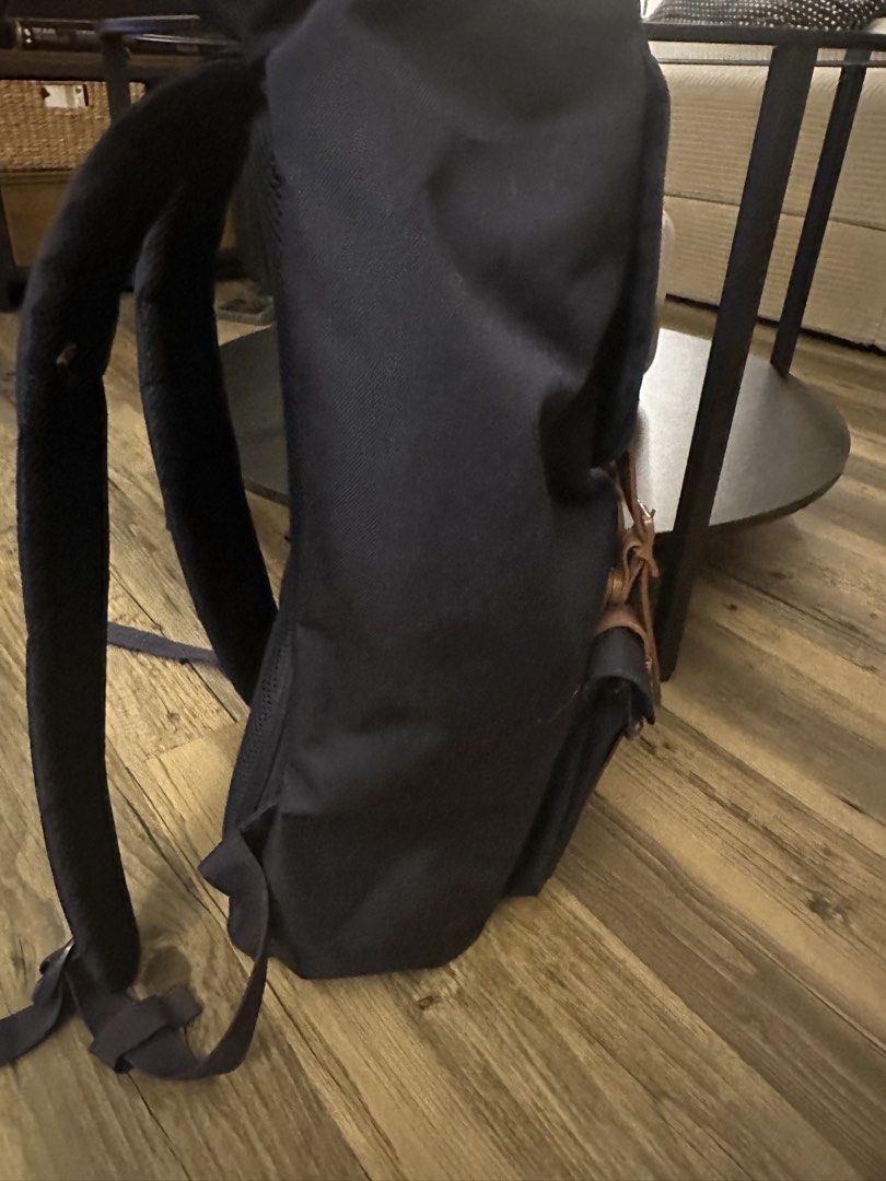 Herschel Supply Co. Navy Blue Backpack (Category: Backpacks) located in Quezon City. Submitted by heiressofpersia80 (Listing ID 1447077568, Image 3). Description: - Classic navy blue Herschel backpack - Brown faux leather straps with buckle closures - Iconic red and white striped interior lining - Ample space for essentials - Adjustable padded shoulder straps for comfort - Ideal for school, work, or everyday adventures LITTLE AMERICA BACKPACK Cla