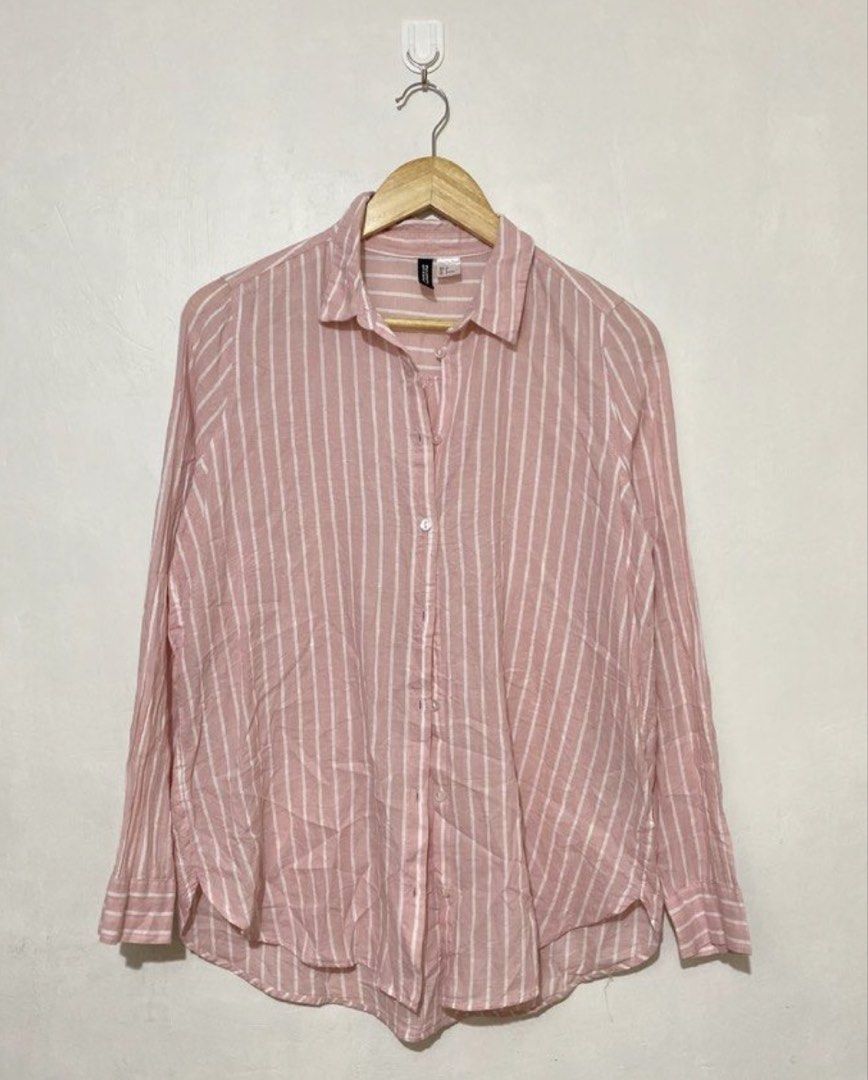 H&M Pink White Striped Long Sleeve Button Up Shirt (Category: Longsleeves) located in Naga. Submitted by Rveebee (Listing ID 1448958721, Image 1). Description: - Brand: H&M - Color: Pink and white stripes - Style: Long sleeve, button-up shirt - Fit: Relaxed - Material feel: Linen blend - Occasion: Casual wear, layering - Styling: Easy to pair with various outfits.