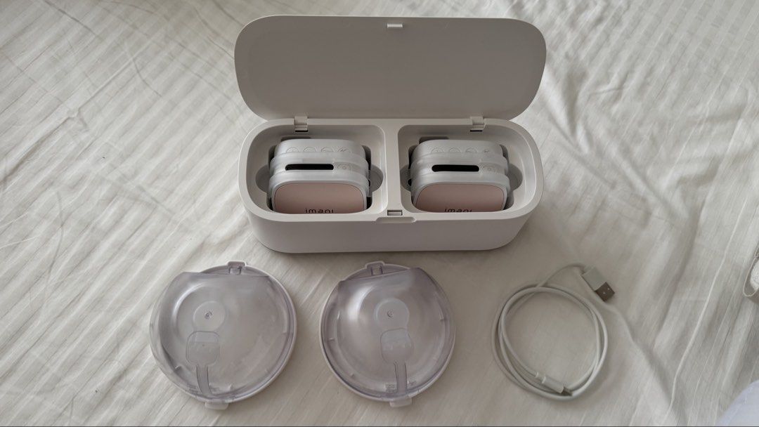 Imani i2 Pro breast pump with Bag (Category: Breastfeeding & Bottle Feeding) located in Muntinlupa City. Submitted by champange101 (Listing ID 1448901659, Image 1). Description: With box Complete set includes: 2 collecting cups 2 motors Charging dock 21mm flange inserts (unused) Lightly used for 2 weeks Pump bag will be included (unused) - unbranded Free: 17, 18, 19mm flange inserts.