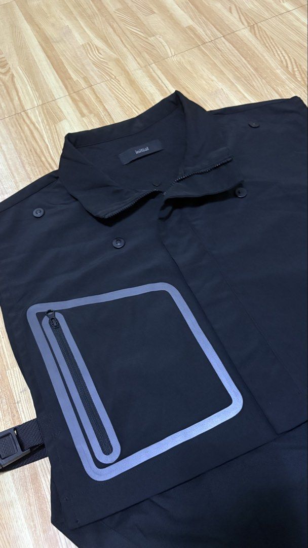 Initial Black Utility Vest with Zip Pocket (Category: Vests) located in Makati City. Submitted by lbrn.jms (Listing ID 1449007848, Image 3). Description: - Brand: Initial - Color: Black - Style: Utility Vest - Features: Layered design, front zip pocket, adjustable side straps - Material: Polyester blend - Usage: Ideal for layering.