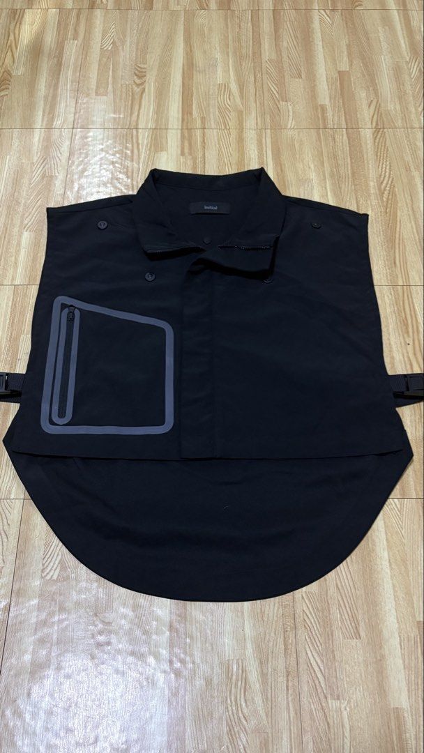 Initial Black Utility Vest with Zip Pocket (Category: Vests) located in Makati City. Submitted by lbrn.jms (Listing ID 1449007848, Image 1). Description: - Brand: Initial - Color: Black - Style: Utility Vest - Features: Layered design, front zip pocket, adjustable side straps - Material: Polyester blend - Usage: Ideal for layering.