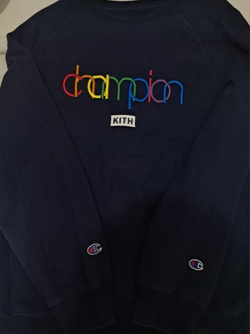 KITH x Champion Rainbow Logo Navy Sweatshirt (Category: Coats, Jackets and Outerwear) located in Caloocan City. Submitted by zwolf1 (Listing ID 1449091287, Image 1). Description: Authentic Navy blue champion kith sweater sweatshirt pullover 9/10 condition Large on tag Complete tags No issue firm.