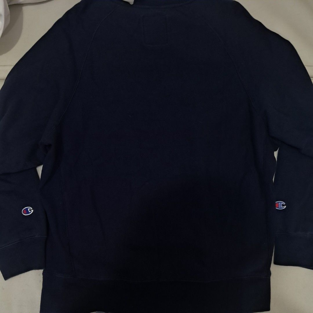 KITH x Champion Rainbow Logo Navy Sweatshirt (Category: Coats, Jackets and Outerwear) located in Caloocan City. Submitted by zwolf1 (Listing ID 1449091287, Image 2). Description: Authentic Navy blue champion kith sweater sweatshirt pullover 9/10 condition Large on tag Complete tags No issue firm.