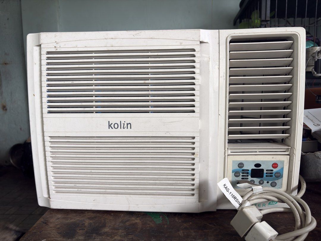 Kolin Window Type Inverter Aircon KAG-110RSINV (Category: Air Conditioning and Heating) located in Marikina City. Submitted by cephasbrothers (Listing ID 1448921838, Image 1). Description: - Kolin Window Type Inverter Air Conditioner - Model: KAG-110RSINV - Capacity: 1 hp - Voltage: 230 volts - Condition: Works well, has some dust and minor scuffs from previous use. - Reason for Selling: No longer needed. - Benefit: Great for cooling down rooms. 
