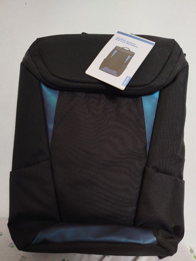 💻LENOVO IdeaPad Gaming 15.6-inch Backpack (Category: Backpacks) located in Bulacan. Submitted by peace.and.love (Listing ID 1448954872, Image 1). Description: ✅Never been used. ⏩Removed the cracked rubber part ng zipper but the zipper is still working needs a strap to move it nalang!🙂 Please see provided photos. - Lenovo IdeaPad Gaming Backpack - Color: Black with blue accents - Fits laptops up to 15.6 inches - Includes original tag and dust ba