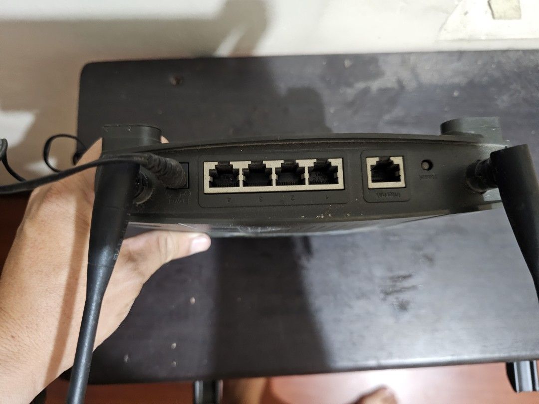 Linksys Wireless-G Broadband Router WRT54G (Category: Networking) located in Marilao. Submitted by bcantong (Listing ID 1449104113, Image 3). Description: - Linksys Wireless-G Broadband Router - Model: WRT54G - Wireless Speed: Up to 54Mbps - Ports: 4 Ethernet ports - Ideal for home or office networks - Adjustable antennas for optimal signal - Note: Power adapter is NOT included.