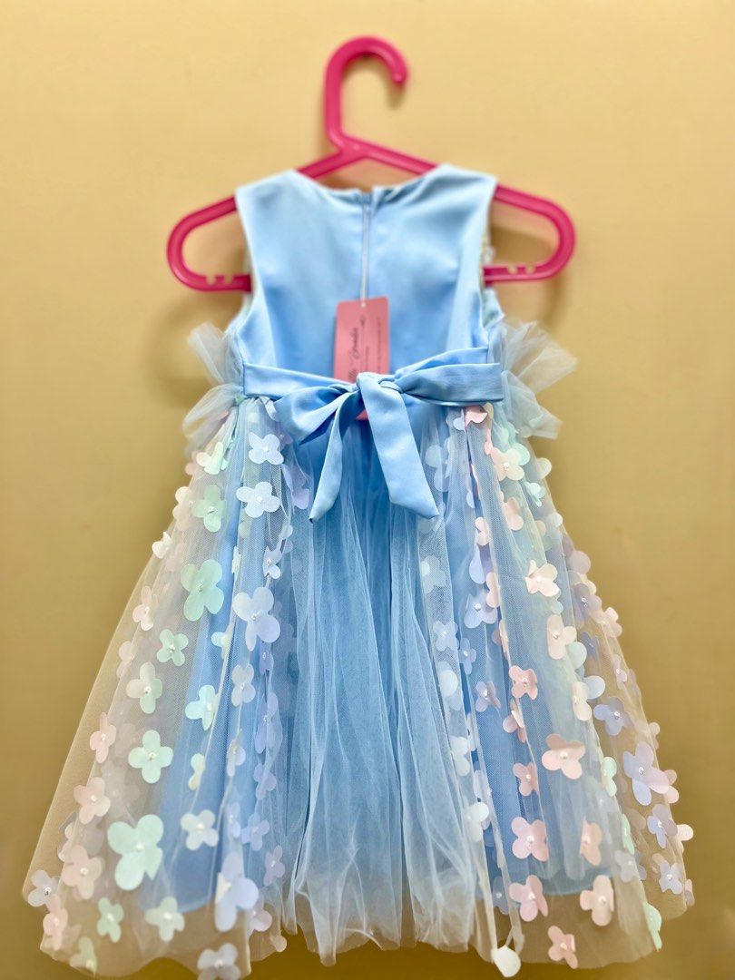 Baby Blue Flower Princess Dress (Category: Babies & Kids Fashion) located in Kuala Lumpur. Submitted by useraw (Listing ID 1448951940, Image 2). Description: - Beautiful light blue dress - Delicate floral appliques - Satin sash ties into a bow at the back - Size 100 - measurement refer to size chart ✨ Comfortable & lightweight ✨ Soft cotton lining ✨ Brand new, never worn ⚠️ Please note: The cotton lining around the neckline has slight yellowing d
