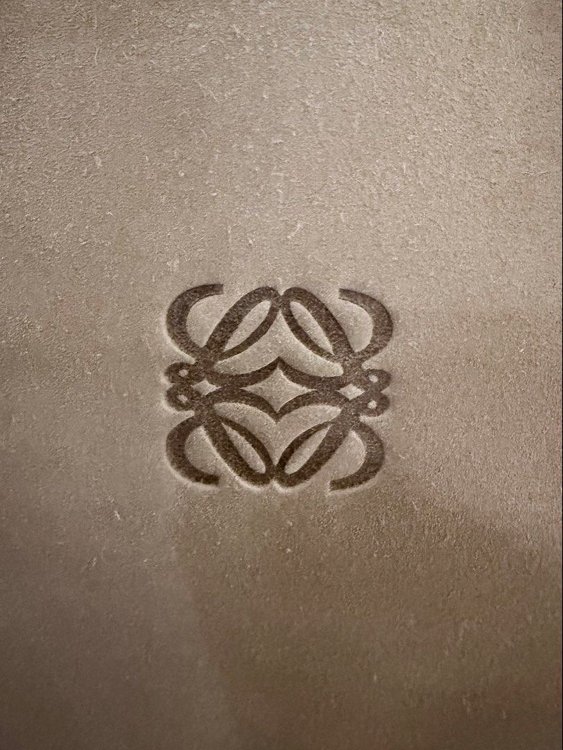 Loewe Suede Tote Bag (Category: Luxury Bags & Wallets) located in Manila. Submitted by vra.luxe (Listing ID 1449019841, Image 3). Description: Inclusions: Dustbag - Authentic Loewe tote bag - Beige suede exterior - White leather trim and interior - Classic Loewe anagram logo embossed on front - Secure magnetic snap closure - Simple and chic design - Ideal for everyday use - Minor Stain Please check or request for more photos. What you see is what