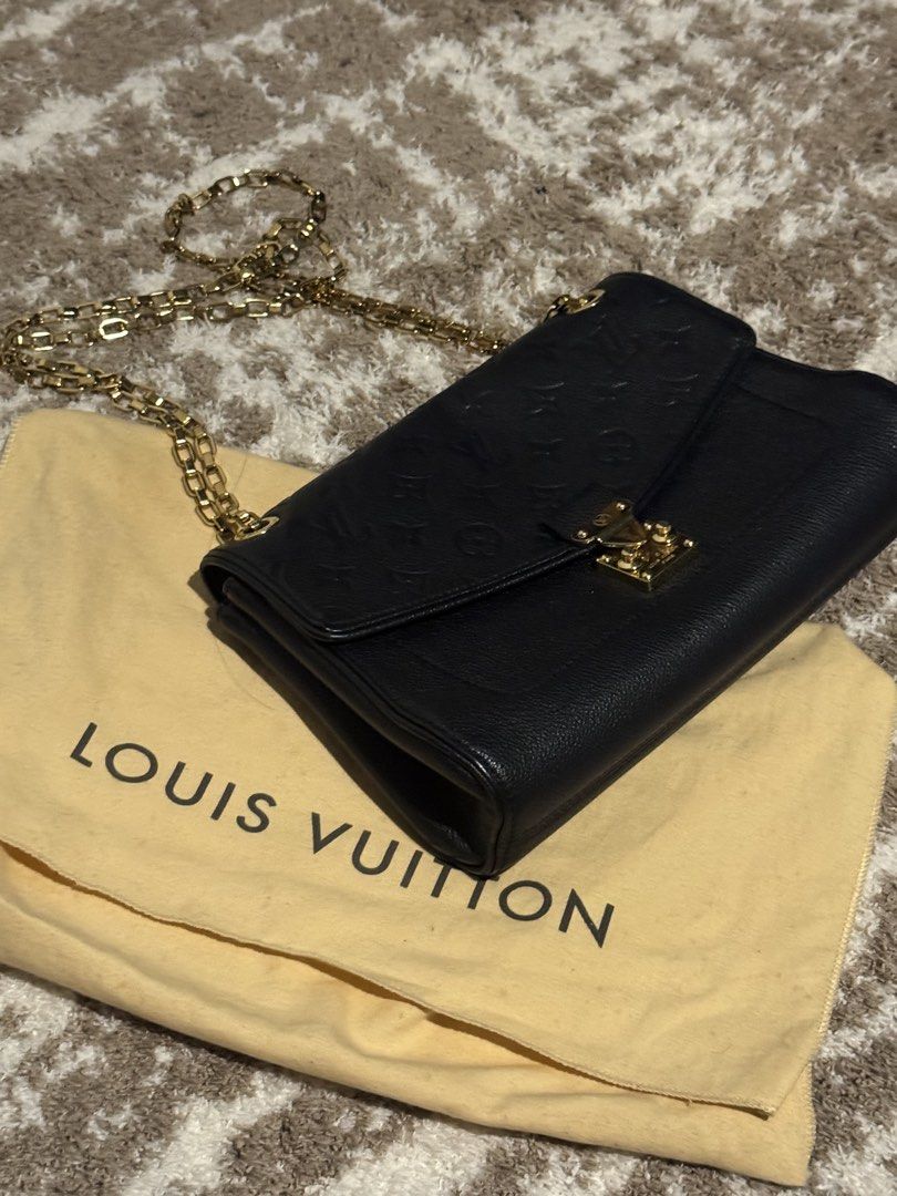 Louis Vuitton Black Leather Monogram Chain Shoulder Bag (Category: Luxury Bags & Wallets) located in Makati City. Submitted by declutter_forsale (Listing ID 1449082319, Image 1). Description: - Authentic Black Louis Vuitton Shoulder Bag - Bought in Makati Greenbelt Louis Vuitton (can bring the bag to check with staff in person) - Louis Vuitton Saint Sulpice PM in Black Monogram Empreinte Leather - Textured leather with iconic embossed monogram - 