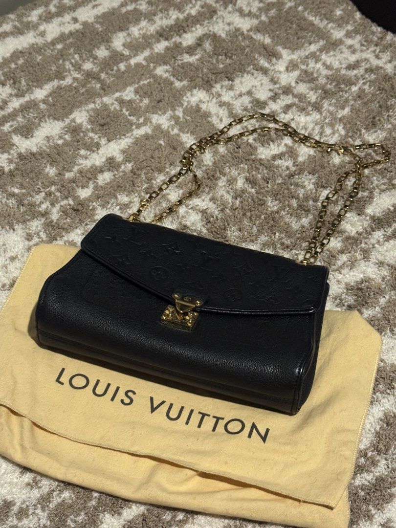 Louis Vuitton Black Leather Monogram Chain Shoulder Bag (Category: Luxury Bags & Wallets) located in Makati City. Submitted by declutter_forsale (Listing ID 1449082319, Image 2). Description: - Authentic Black Louis Vuitton Shoulder Bag - Bought in Makati Greenbelt Louis Vuitton (can bring the bag to check with staff in person) - Louis Vuitton Saint Sulpice PM in Black Monogram Empreinte Leather - Textured leather with iconic embossed monogram - 
