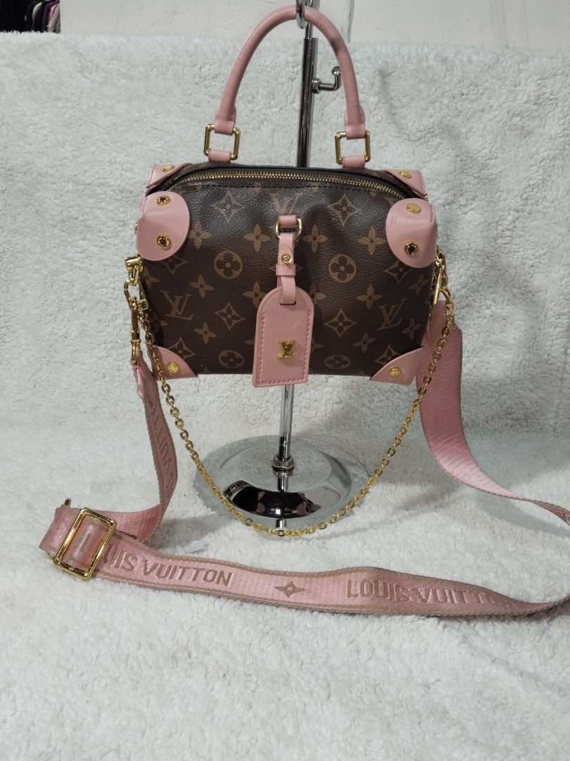 Louis Vuitton Monogram Canvas Pink Trim Speedy Bag (Category: Luxury Bags & Wallets) located in Caloocan City. Submitted by jezel07 (Listing ID 1449091221, Image 2). Description: - Classic Louis Vuitton Speedy bag - Monogram canvas with pink leather trim and details - Top handles and long adjustable strap - Gold hardware - Includes matching leather luggage tag - Versatile for everyday use or evening outings.