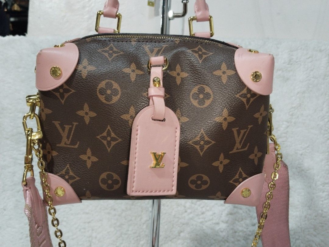 Louis Vuitton Monogram Canvas Pink Trim Speedy Bag (Category: Luxury Bags & Wallets) located in Caloocan City. Submitted by jezel07 (Listing ID 1449091221, Image 3). Description: - Classic Louis Vuitton Speedy bag - Monogram canvas with pink leather trim and details - Top handles and long adjustable strap - Gold hardware - Includes matching leather luggage tag - Versatile for everyday use or evening outings.