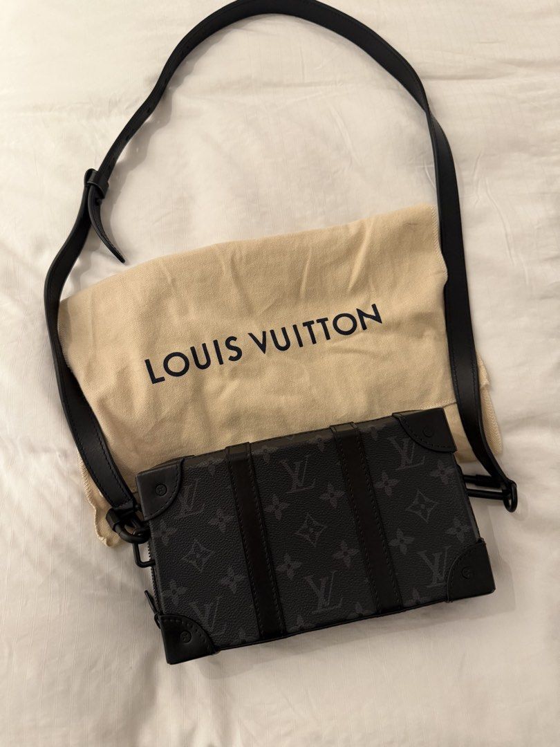 Louis Vuitton Soft Trunk Monogram Eclipse Crossbody & Clutch Bag (Category: Luxury Bags & Wallets) located in Makati City. Submitted by luxebrands88 (Listing ID 1448979557, Image 2). Description: - Authentic Louis Vuitton Crossbody / Clutch Bag - Bought from Greenbelt. - Classic Black monogram eclipse canvas - Versatile: Removable strap for crossbody wear - Functional interior with multiple card slots - Comes with original dust bag - Ideal for ev