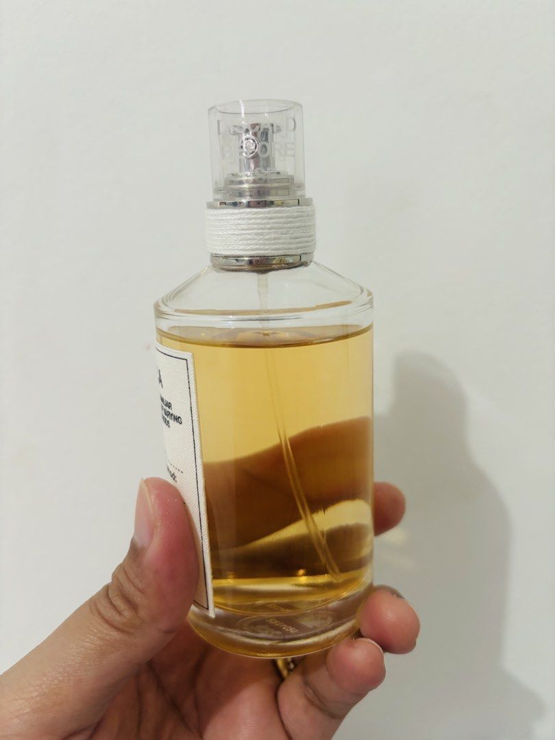 Maison Margiela perfume - Beach Walk scent (Category: Fragrance & Deodorants) located in Manila. Submitted by estheregg (Listing ID 1448939526, Image 2). Description: Been a month now pero sobrang konti p lng nabawas. Sobrang tipid, lasts more than 12 hours ung amoy. costs 9k here sa pinas..