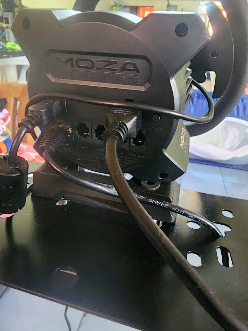 Moza Racing Wheel and Pedals with Stand (Category: Controllers) located in Caloocan City. Submitted by erreiv (Listing ID 1448990973, Image 3). Description: - Moza R3 Racing Wheel and Pedals for PC. > Complete set (with pit) (box and manual included) Less than a month used. (Pit bought separately worth 2500) - sturdy stand - All necessary cables included - Ready for your sim racing setup - Improves gaming experience - In good working condition.
