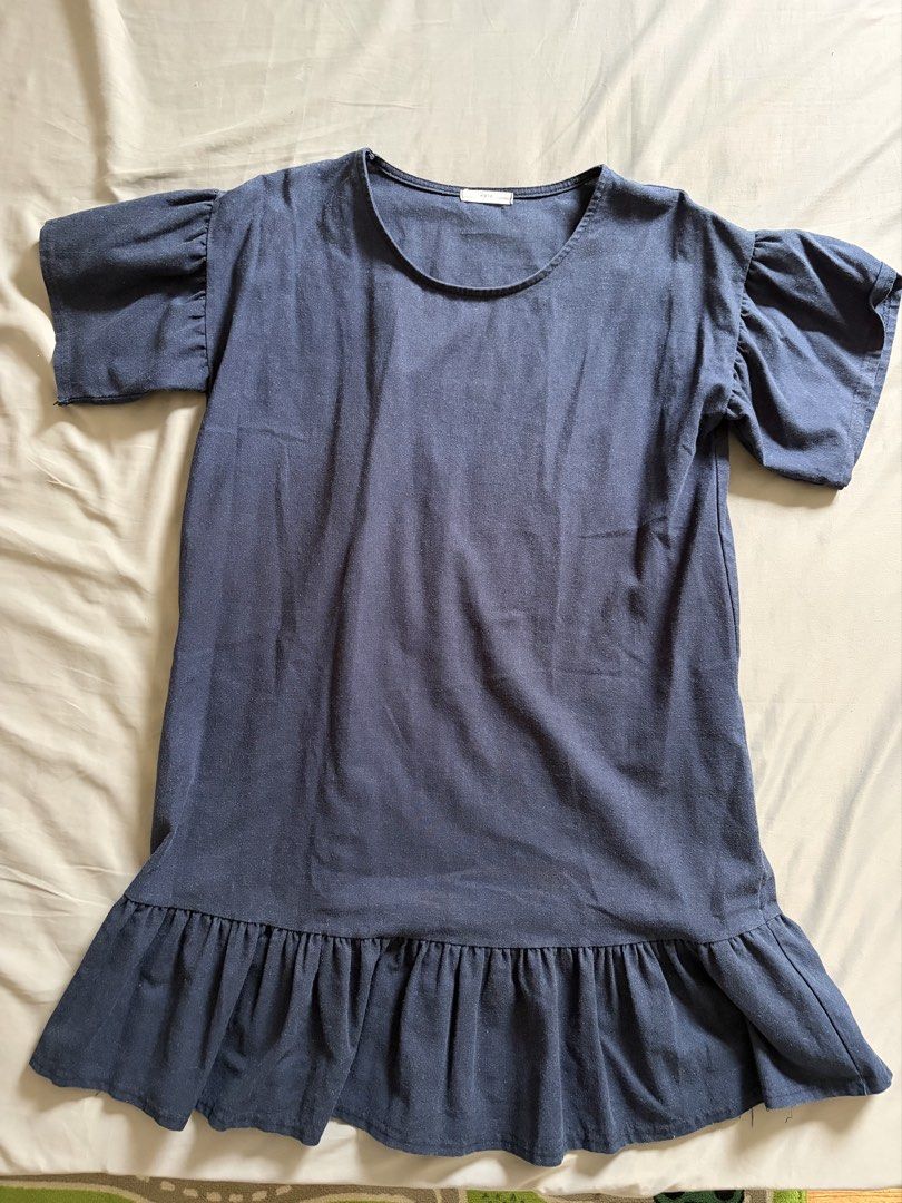 Navy Blue Ruffle Sleeve Dress (Category: Dresses) located in Manila. Submitted by anayells (Listing ID 1449010747, Image 2). Description: - Navy blue dress from Epic - fits S to M - Short sleeves with cute ruffle detail - Ruffle detail on the hem - Simple and comfy design - Great for casual wear.