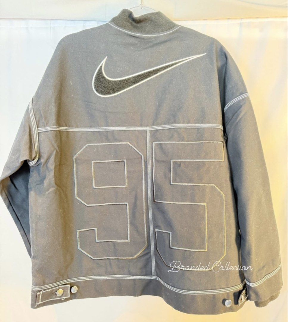 Nike Black Bomber Jacket (Category: Coats, Jackets and Outerwear) located in Manila. Submitted by usbrandedcollections (Listing ID 1448898466, Image 2). Description: SKU: CLT-NKE-0022 Sleek Black Bomber Jacket. Features distintive white stitching. Ideal for casual wear. Graphic. Oversized cargo jacket. Medium. Oversized fit. Front zip fastening. Side pockets. Cotton 100%. FYI: pwede Unisex ✅ 💯% Legit Seller ✅ 💯 Authentic 🇺🇸 (All items bought 
