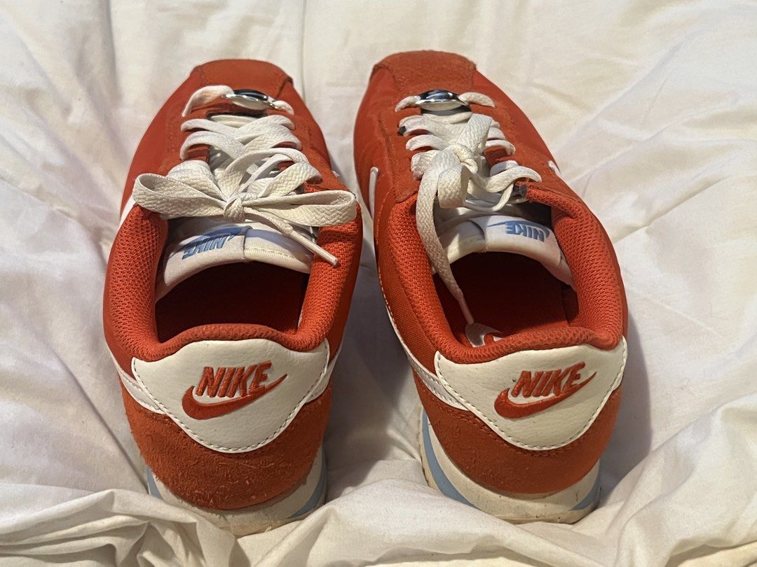Nike Cortez Red White Blue Sneakers (Category: Sneakers) located in Marikina City. Submitted by danienbi (Listing ID 1449070897, Image 2). Description: - Classic Nike Cortez sneakers - Vibrant red color - Barely used - Size: 7 US - Ideal for casual wear or light athletic activities.
