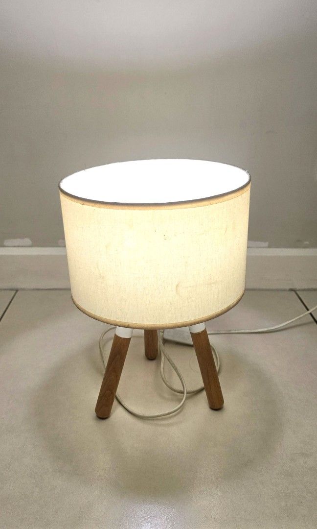 Nordic Desk Lamp Beige and White (Category: Lighting) located in Quezon City. Submitted by queentana_finds (Listing ID 1448989558, Image 1). Description: Lightly used. No damage. Nordic design,white and beige. No issues with bulb, photo provided in the album. 2 socket outlet, 220 v. Ikea-ish peg. Very aesthetic. Used this during pandemic when I was working from home. RFS: Declutter..