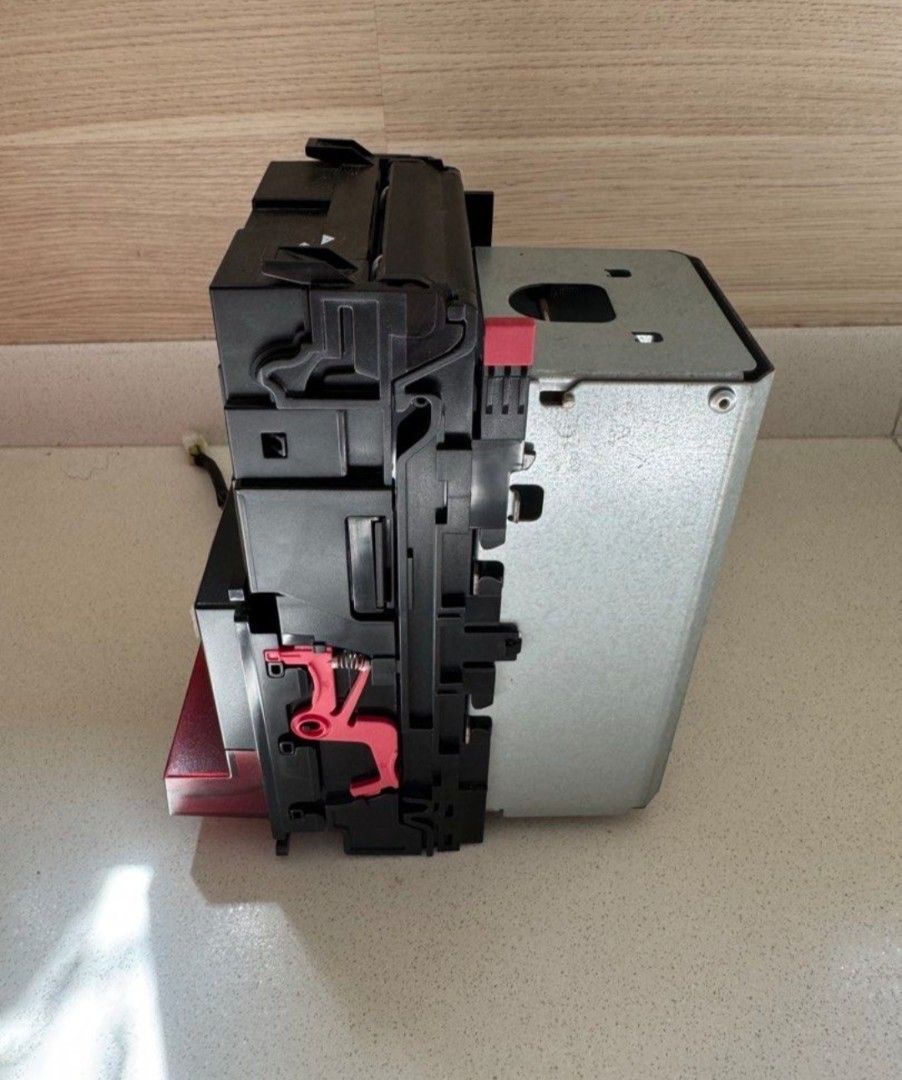 Note Validator/Acceptor MDB (Category: Other Electronics) located in Singapore. Submitted by HotClaw (Listing ID 1448957575, Image 2). Description: Used for 2yrs. Bought For $500, selling at $170 FAST DEAL! ✅️ Well Maintained and Tested before listing ✅️ Can be used for Claw Machine/all types of Vending Machines ✅️ Accepts $2, $5, $10 Notes ✅️ Able to detect & reject Fake notes! ✅️ Cheapest in the market! ✅️ Free Delivery!.