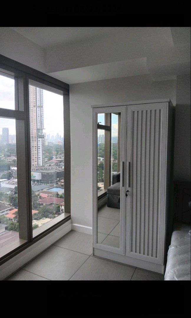 ONE WILSON SQUARE 2 Bedroom Bare (Category: Apartments & Condos) located in Quezon City. Submitted by bengco99 (Listing ID 1449036566, Image 3). Description: middle floor bare 2 bedrooms 2 bathroom no parking 12.8m gross 11.5 m net for details please call Beng 0916-638-4533 0998-367-9008.