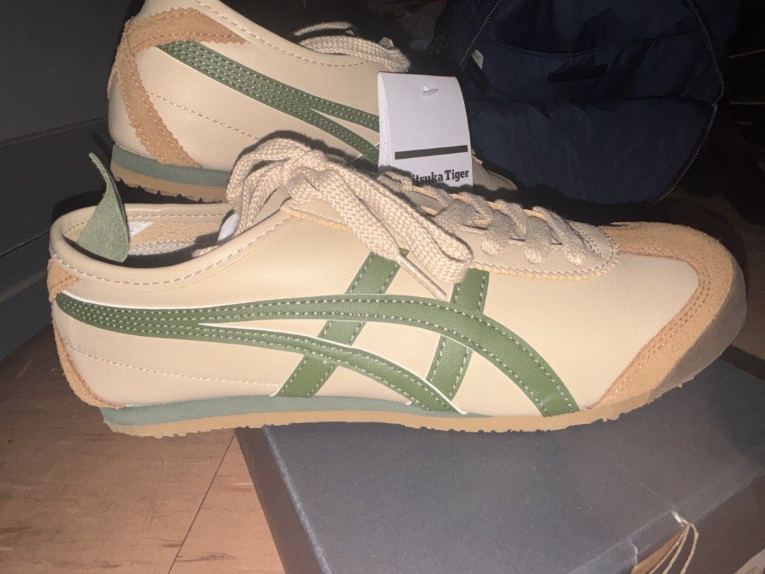 Onitsuka Tiger Mexico 66 Beige/Grass Green (Category: Sneakers) located in Cavite. Submitted by edithb0121 (Listing ID 1449004874, Image 2). Description: - Brand New Onitsuka Tiger Mexico 66 - Color: Beige/Grass Green - Size: US 6 (Women's 7.5) / 24.5cm - Condition: Never worn, fresh - Includes: Original box and tags - Style: Classic, ideal for everyday wear RFS: will buy another shoes design.