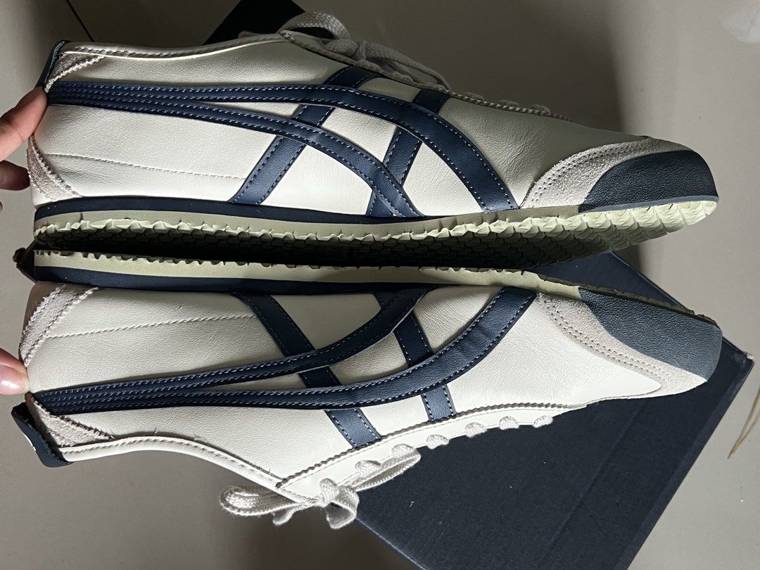 Onitsuka Tiger Mexico 66 Cream Navy (Category: Casual Shoes) located in Manila. Submitted by ladx_ (Listing ID 1449061011, Image 2). Description: - BRANDNEW - Classic Onitsuka Tiger sneakers - Color: Cream and Navy - Size: 46 EU / 10.5 UK / 11.5 US - Ideal for everyday wear - Comes with original box and Paper bag - Brought from japan - RFS: Wrong Size.