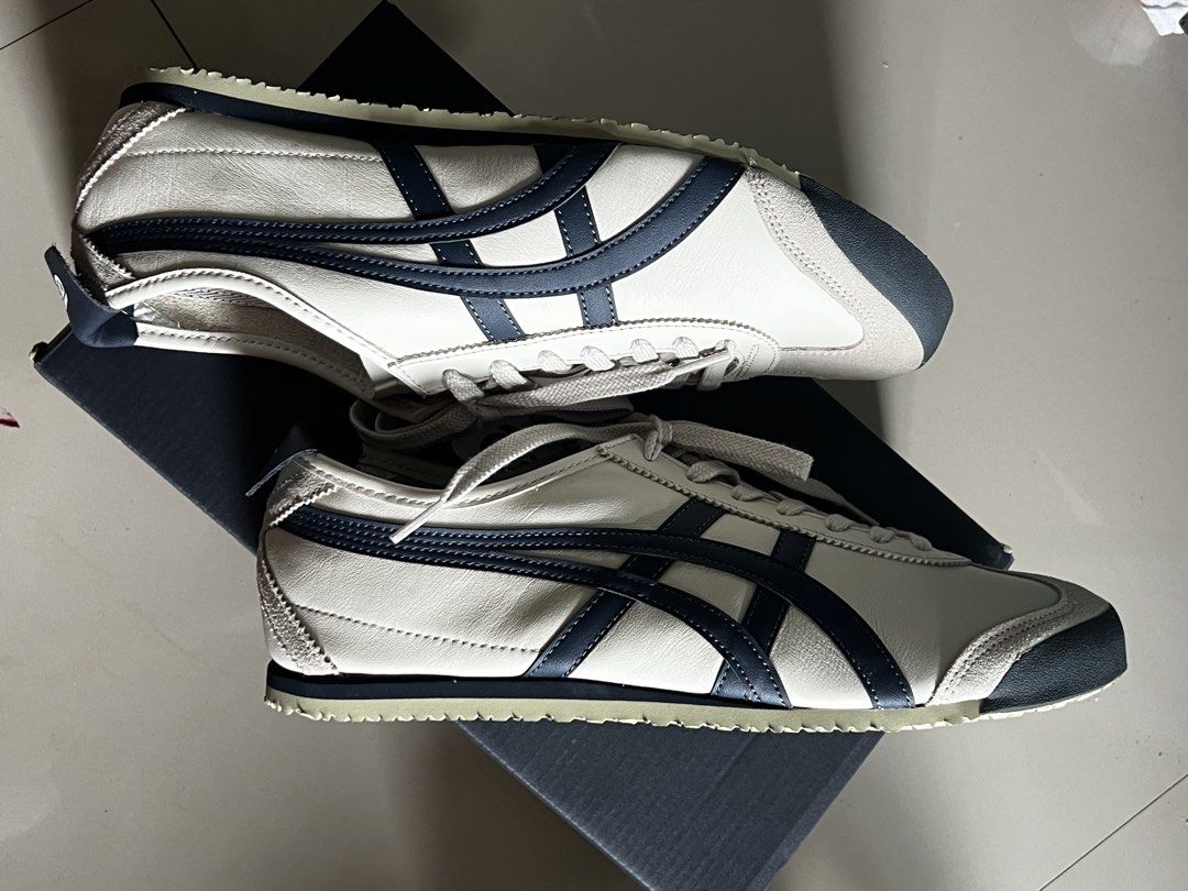 Onitsuka Tiger Mexico 66 Cream Navy (Category: Casual Shoes) located in Manila. Submitted by ladx_ (Listing ID 1449061011, Image 3). Description: - BRANDNEW - Classic Onitsuka Tiger sneakers - Color: Cream and Navy - Size: 46 EU / 10.5 UK / 11.5 US - Ideal for everyday wear - Comes with original box and Paper bag - Brought from japan - RFS: Wrong Size.